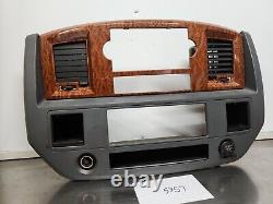 06-08 Dodge Ram 1500 2500 Single Din Dash Radio Bezel With Wood Grain Gray OEM